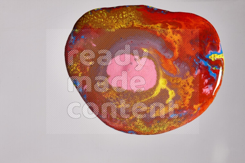 Close-ups of assorted colors blending on a grey background