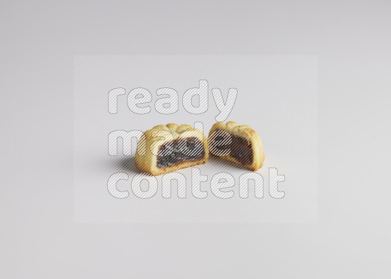 Half Maamoul filled with date direct on white background
