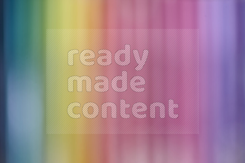 The image captures a close-up of sharpened colored pencils on multicolored background