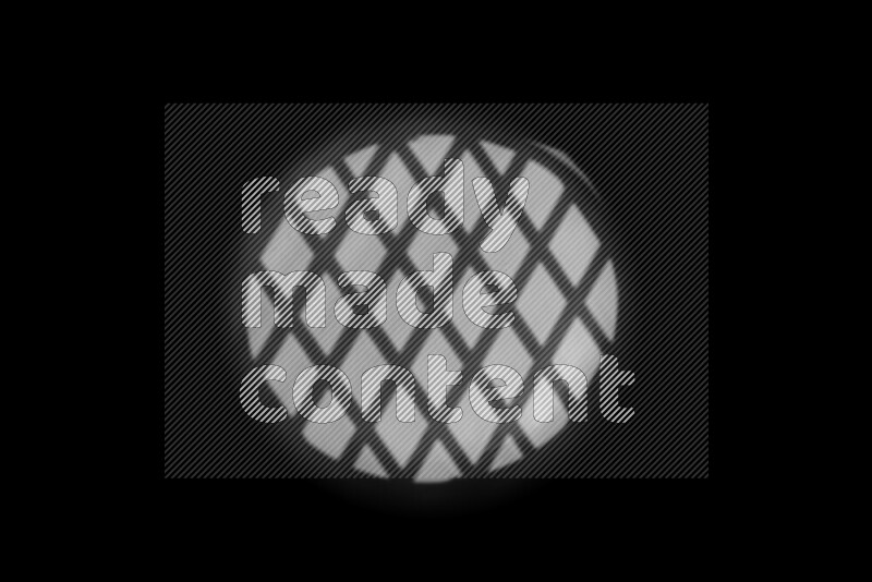 مجموعة من ضوء الغوبو الخافت تظهر أنماط هندسية علي سطح ناعم