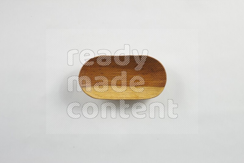 A wooden plate on white background