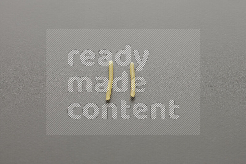 Vermicelli pasta on grey background