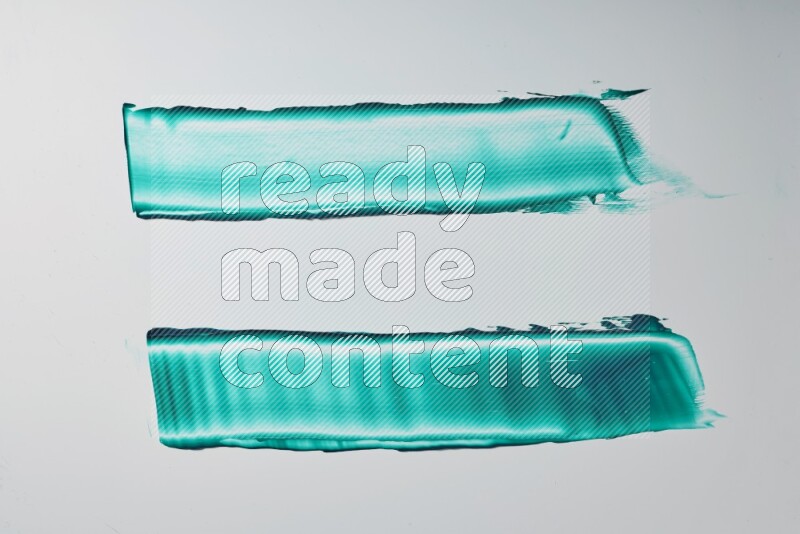 Turquoise painting knife strokes on white background