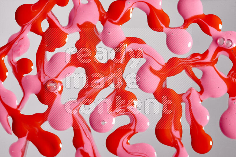 Abstract colorful background with mixed of pink and red paint colors