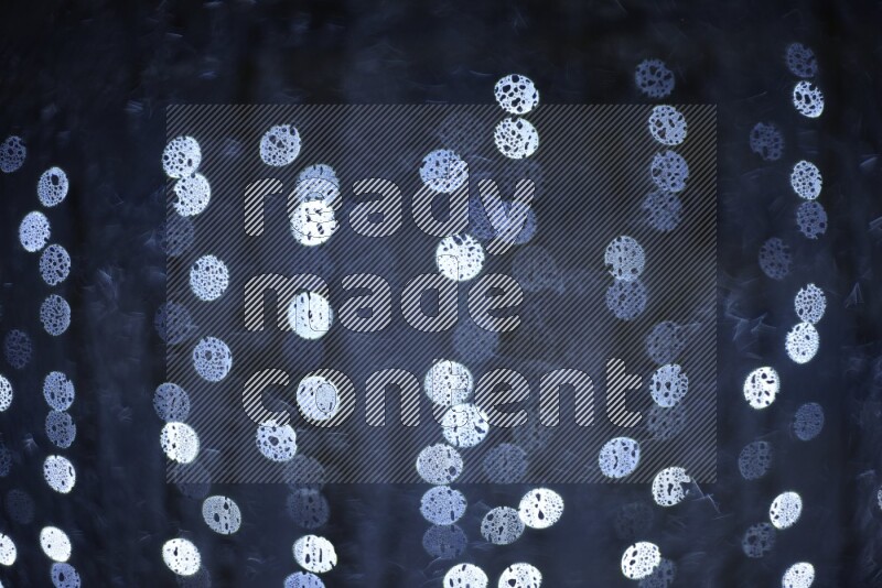 Bokeh light in white with water drops