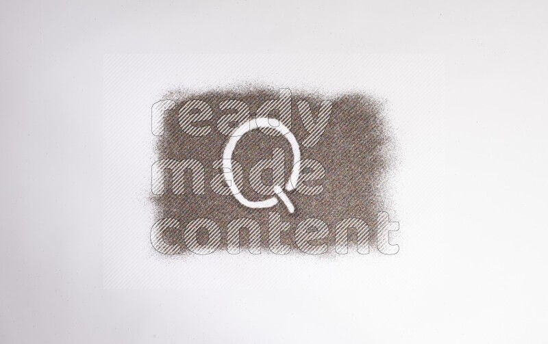 Alphabets written with glitter on white background