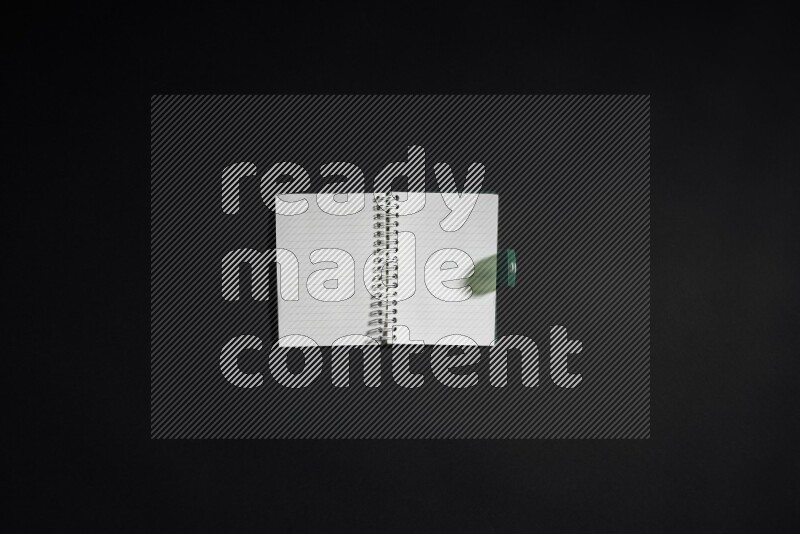 Notebook sheet on black background