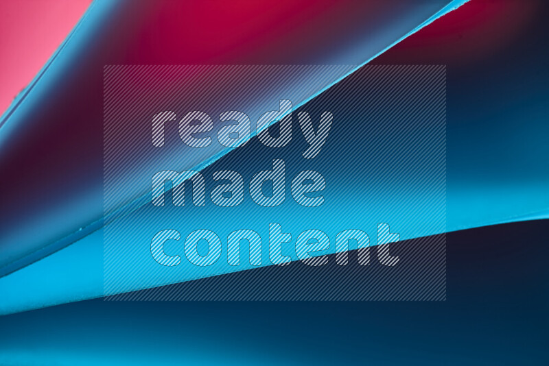 An abstract art piece displaying smooth curves in warm and cold gradients created by colored light