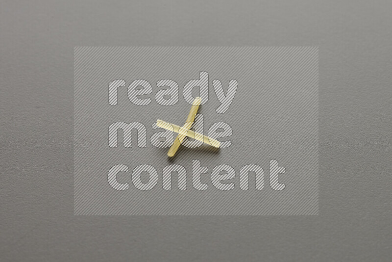Vermicelli pasta on grey background