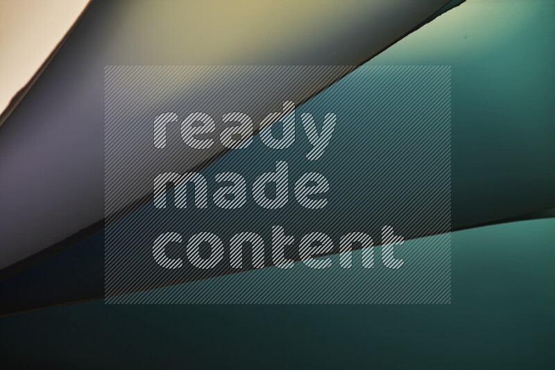 An abstract art piece displaying smooth curves in cold gradients created by colored light