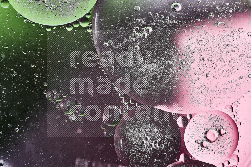 Close-ups of abstract oil bubbles on water surface in shades of green, purple and pink