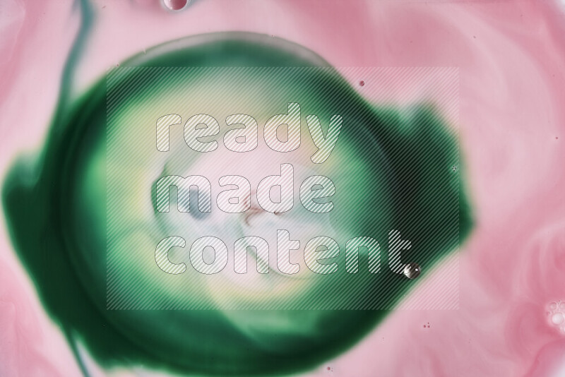 A close-up of abstract swirling patterns in red and green