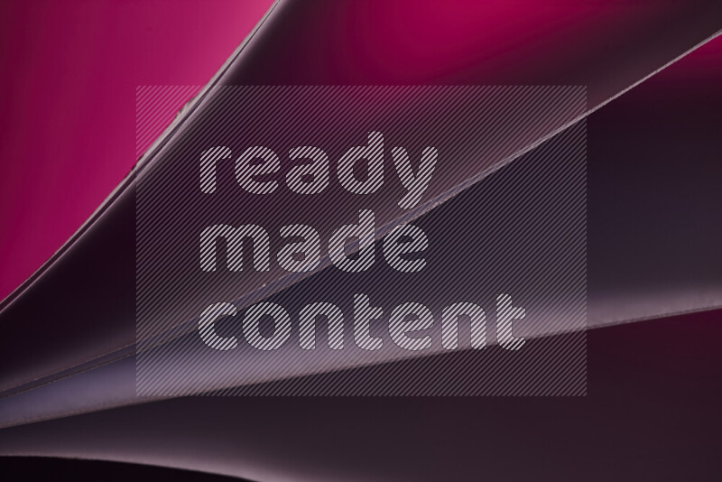 فن تجريدي يعرض منحنيات مع تدرجات الألوان الدافئة والباردة مكونه بضوء ملون