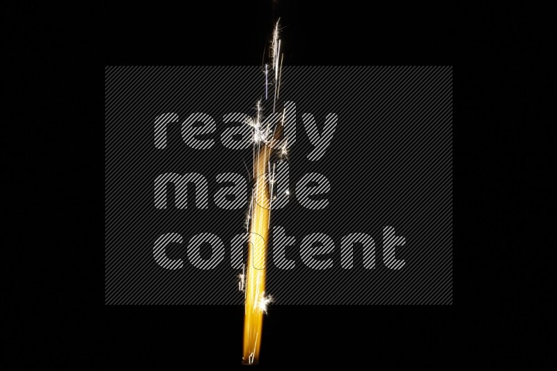 Sparkler candle isolated on black background