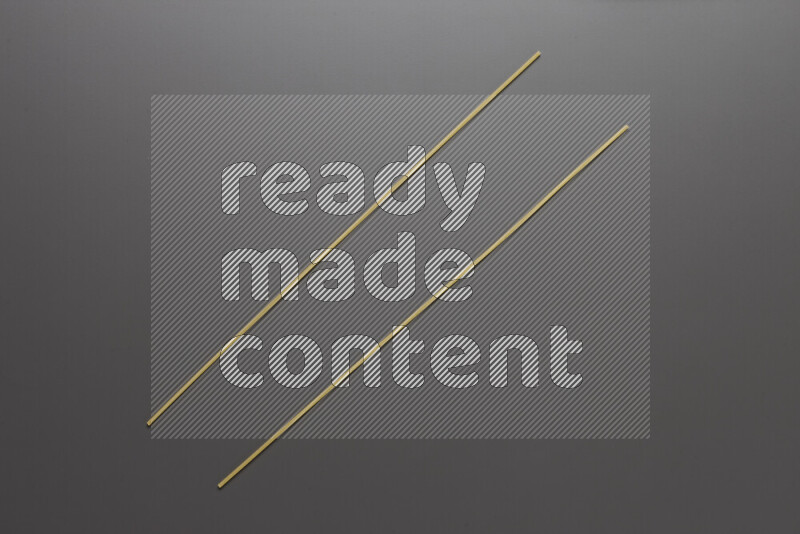 Spaghetti pasta on grey background