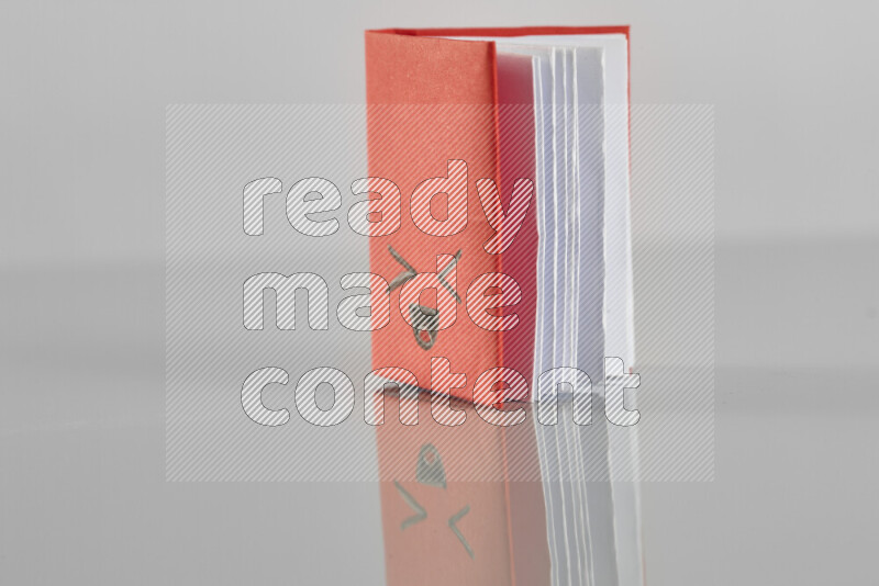 Origami book on grey background
