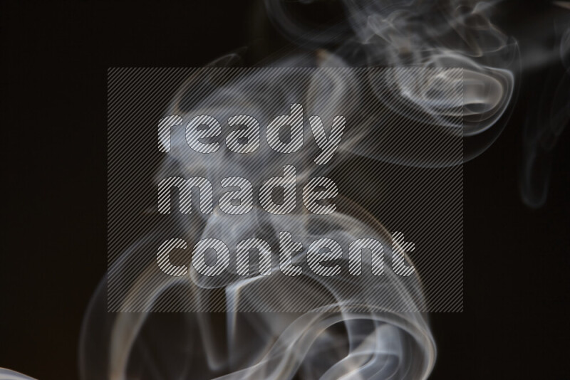 Motion of wavy smoke isolated on dark background