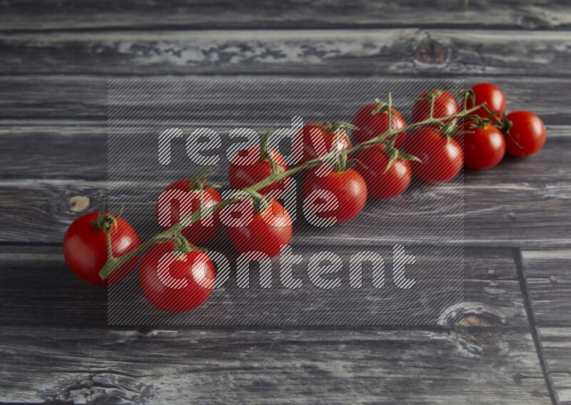 45 cherry tomato vein on a textured grey wooden background