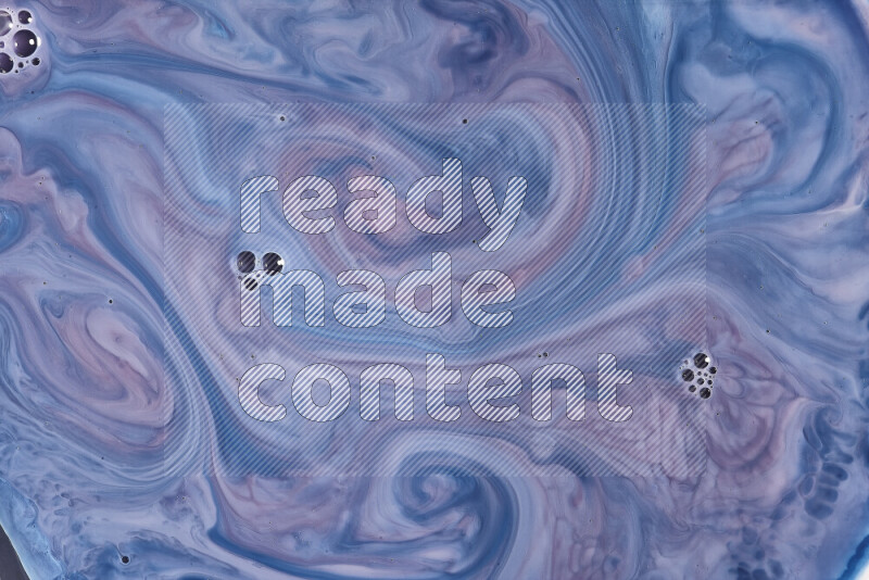 لقطة مقربة لأنماط دوامية باللون الأزرق والأحمر والأبيض