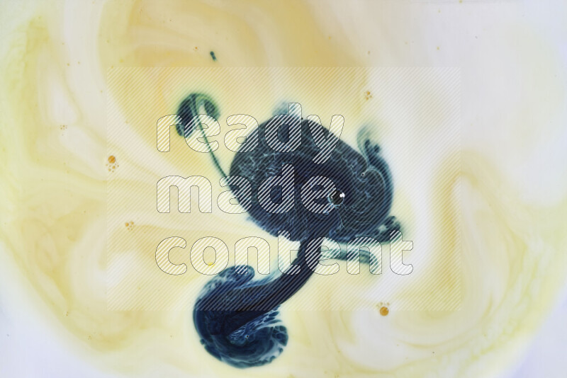 لقطة مقربة لأنماط دوامية باللون الأصفر والأخضر