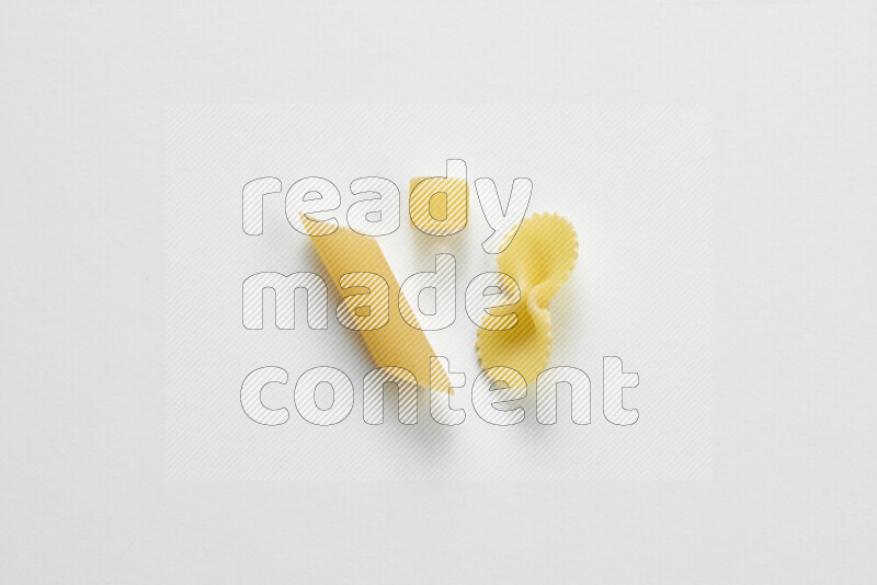 Different pasta types on white background