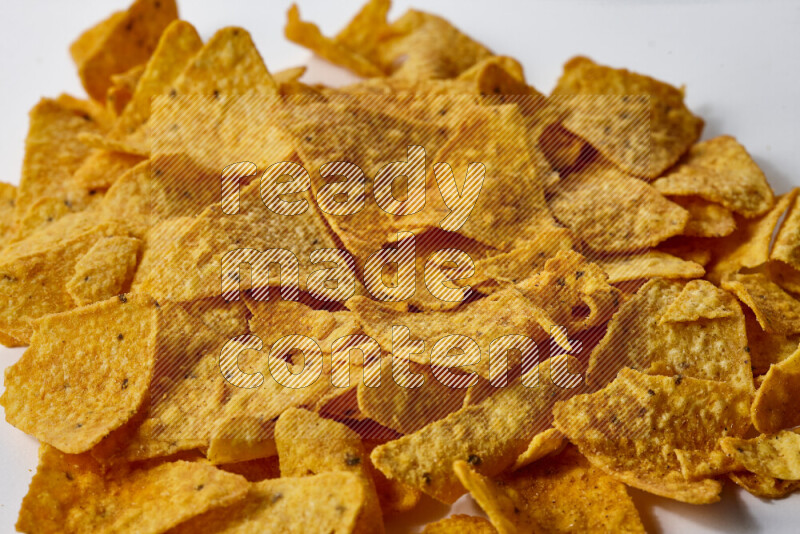 Nachos snacks on white background