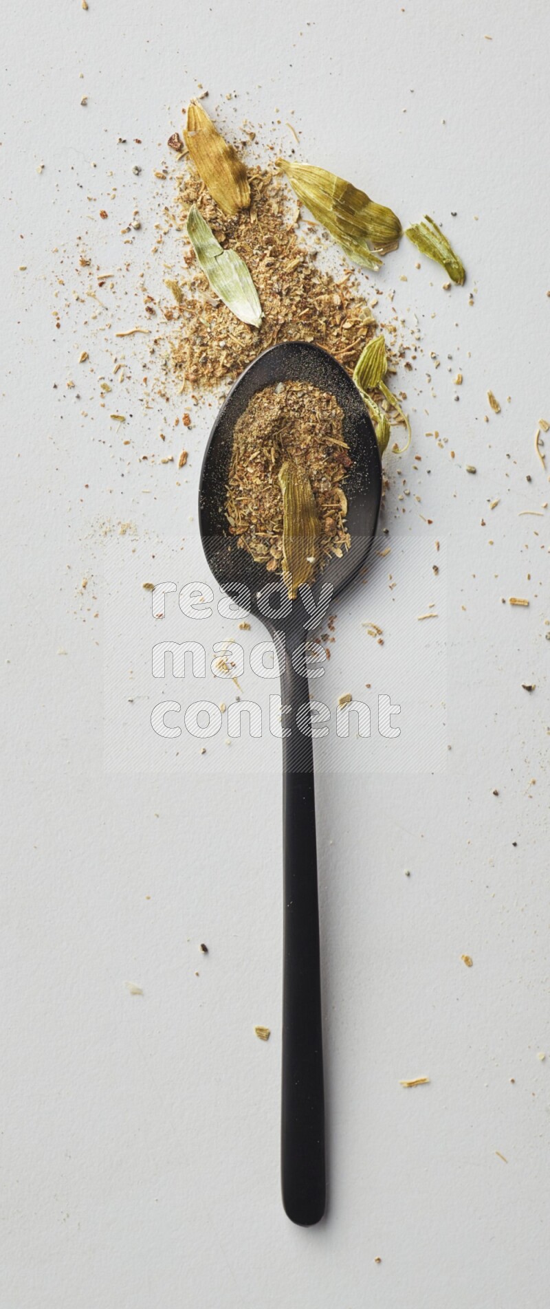 Top-view shot of Cardamon on white background