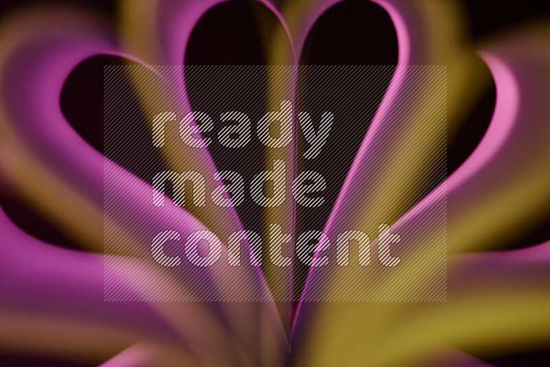 An abstract art piece displaying smooth curves in yellow and pink gradients created by colored light