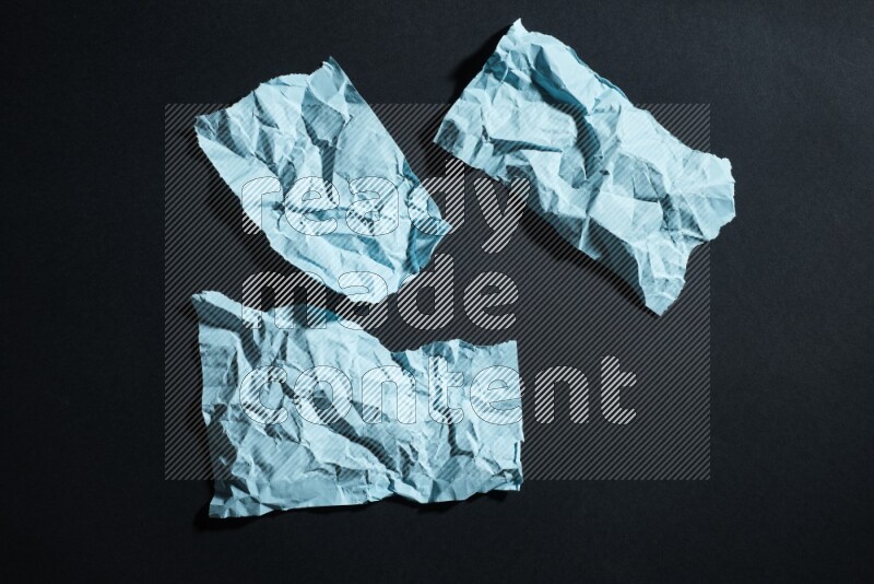 Blue paper sheet on black background