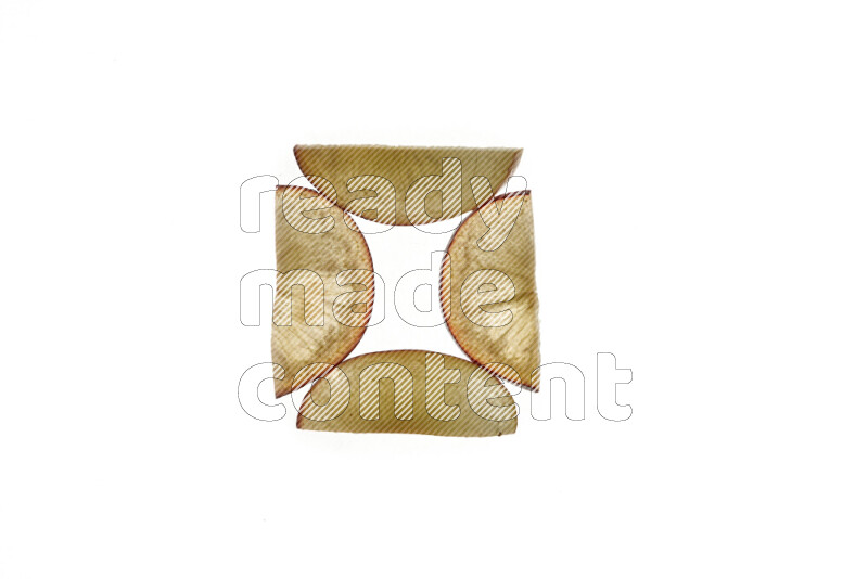 Plum slices on illuminated white background