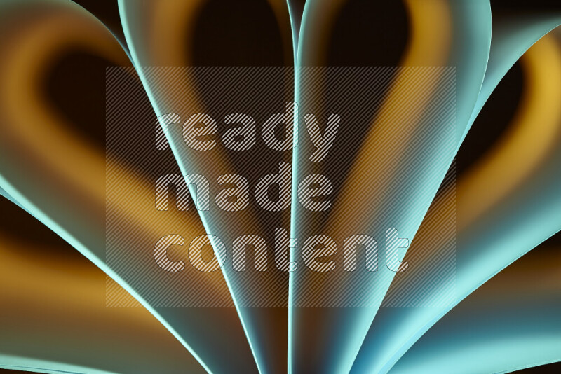 فن تجريدي يعرض منحنيات وتدرجات اللون الأصفر والأخضر مكونه بضوء ملون