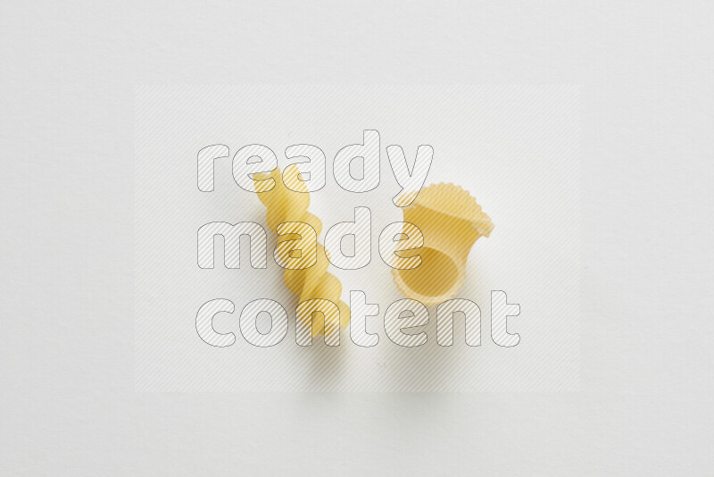 Different pasta types on white background