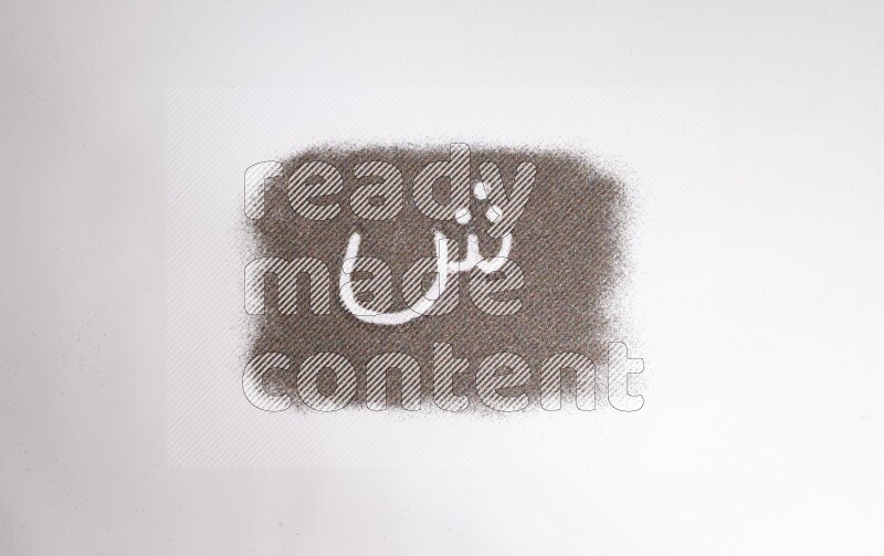 Arabic alphabets written with glitter on white background