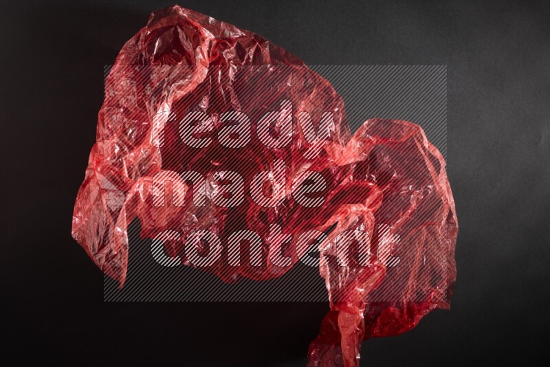 Colored plastic textures on black background