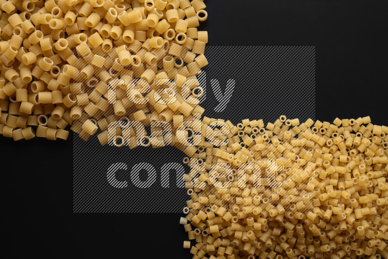 Different pasta types on black background