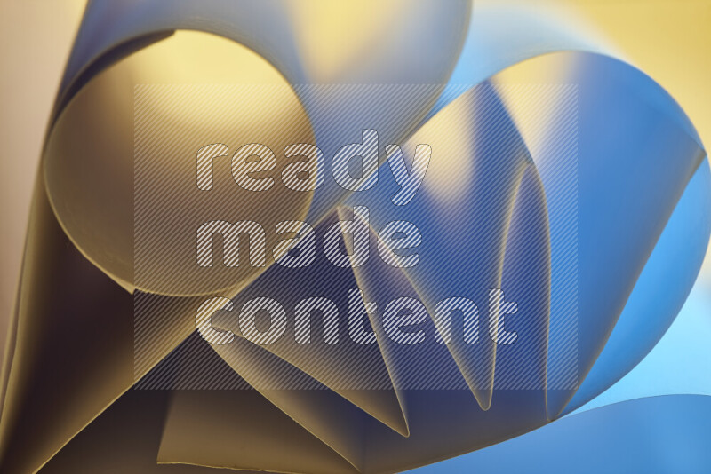 An artistic display of paper folds creating a harmonious blend of geometric shapes, highlighted by soft lighting in blue and warm tones