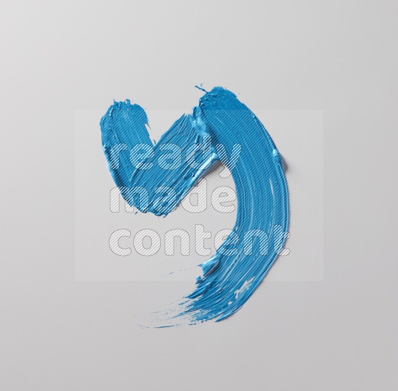 Multi blue curved brush strokes shaped into different shapes on a white background