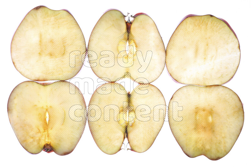 Apple slices on illuminated white background