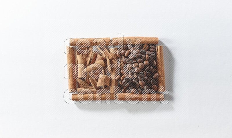 2 squares of cinnamon sticks full of coffee beans and cinnamon on white flooring
