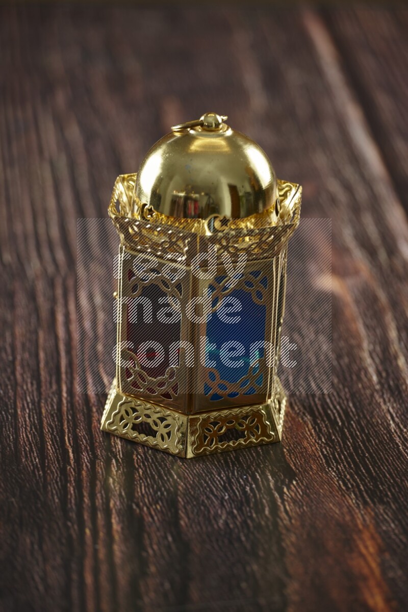 A lantern placed on a wooden background