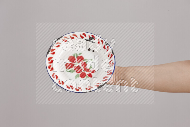 Woman hands holding different metal essentials in different positions