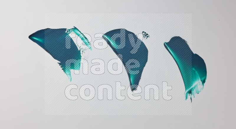Turquoise painting knife strokes on white background