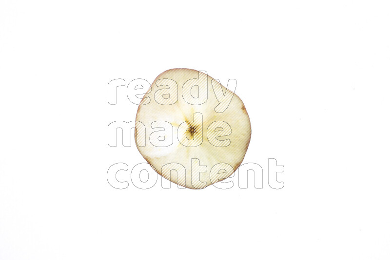 Apple slices on illuminated white background