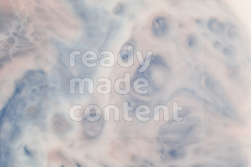 A close-up of abstract swirling patterns in blue, red and white