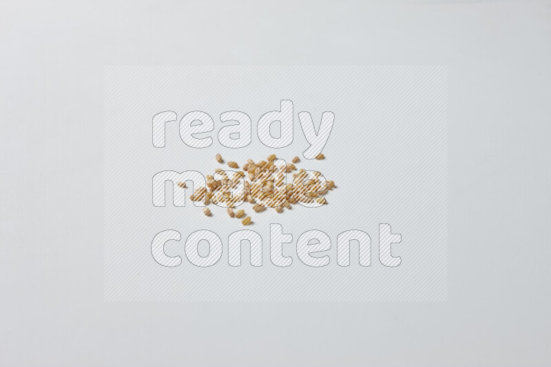Hulled wheat on white background