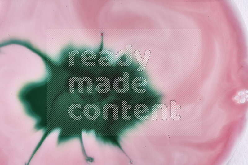 صورة مقربة لأنماط دوامية مجردة باللون الأحمر والأخضر