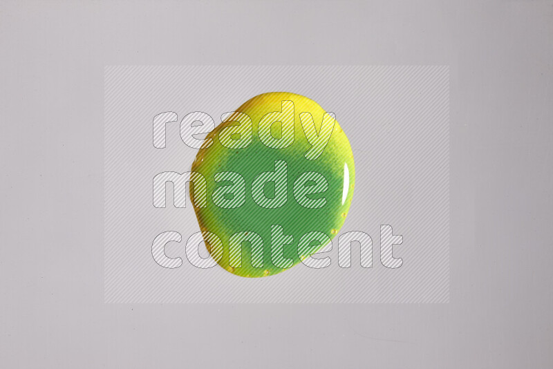 Close-ups of assorted colors blending on a grey background