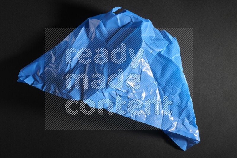 Colored plastic textures on black background