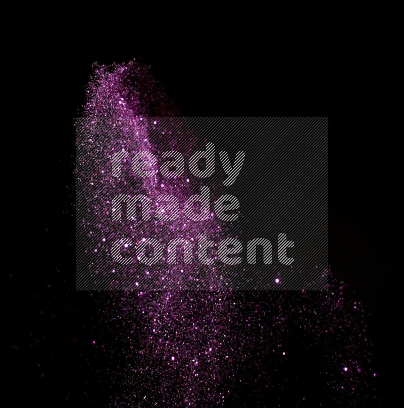 Pink glitter powder isolated on black background