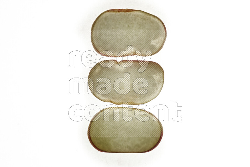 Peach slices on illuminated white background